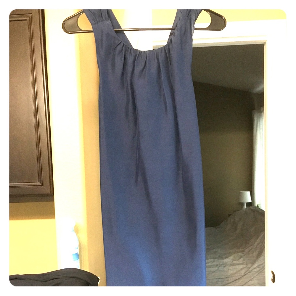 Classic navy satin dress with crisscrossed back.